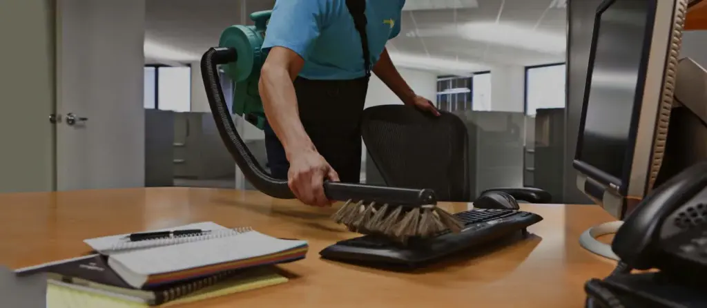 cluttered office desk before cleaning